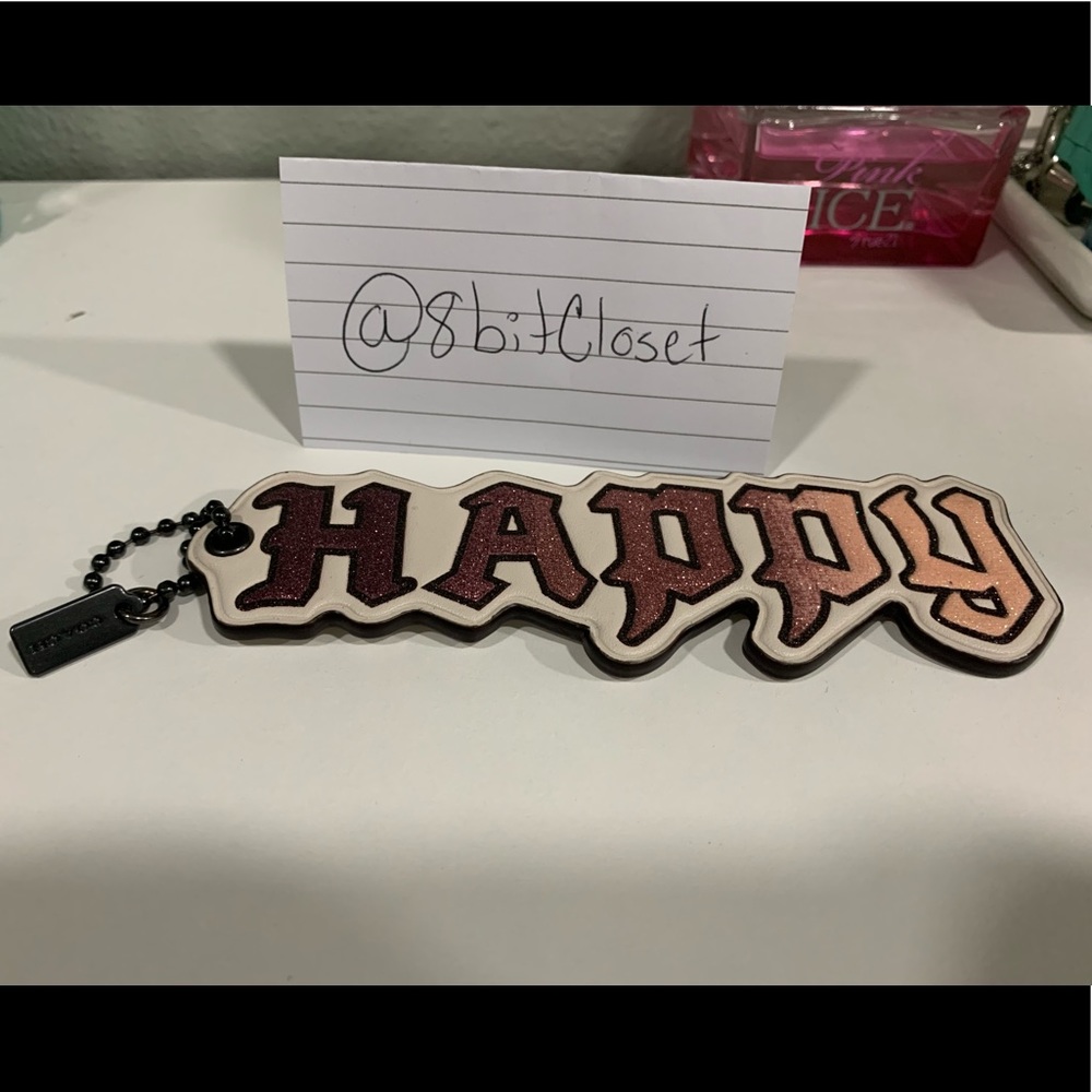 Coach x Disney “Happy” keychain/charm